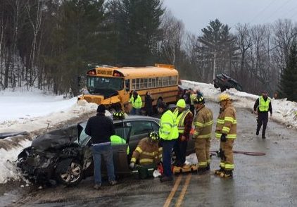 Police and emergency responders in Kingfield at the scene Thursday morning of a five-vehicle crash, which involved a school bus.