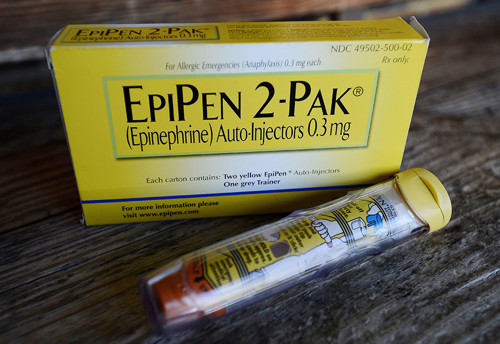 An EpiPen epinephrine auto-injector, a Mylan product. In the aftermath of negative reaction to its pricing, Mylan expanded the financial aid it offers customers and launched its own authorized generic in December, priced at around $300 per two-pack.