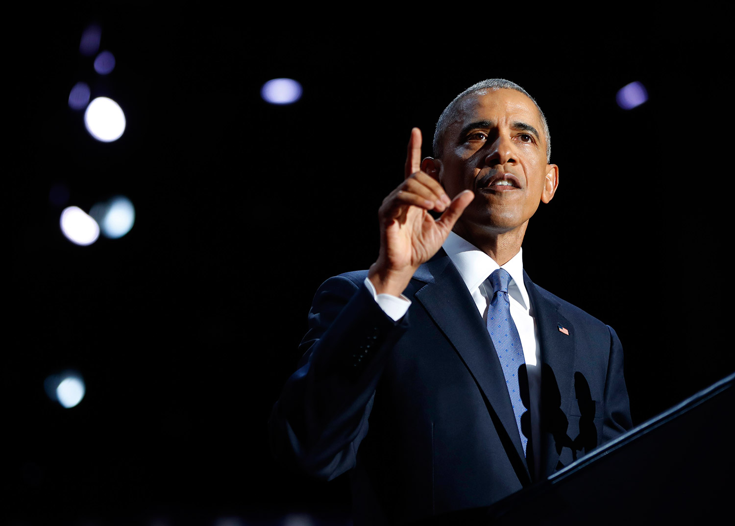President Obama speaks during his farewell address at McCormick Place in Chicago on Tuesday night. He said he ends his tenure inspired by America's "boundless capacity" for reinvention. Associated Press/Pablo Martinez Monsivais