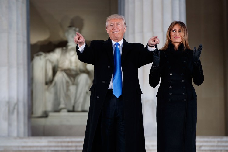 Then President-elect Donald Trump and  wife Melania arrive at the "Make America Great Again Welcome Concert" at the Lincoln Memorial, on the eve of Trump's inauguration.