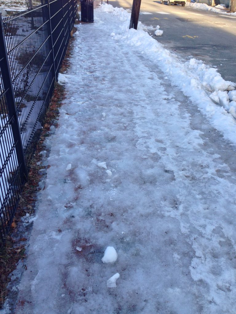 The sidewalk next to Marada Adams Park on Munjoy Hill is an icy mess on Jan. 5.
