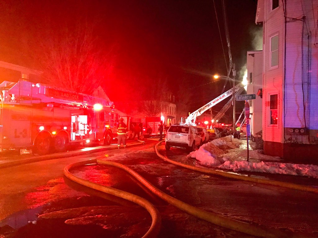 Fire crews respond to a fire on Cumberland Avenue in Portland Monday night.