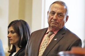 Gov. Paul LePage is calling for a moratorium on retail sales of marijuana, saying the state may need more time to set up a regulatory system than the nine months provided by the law approved by voters in November.