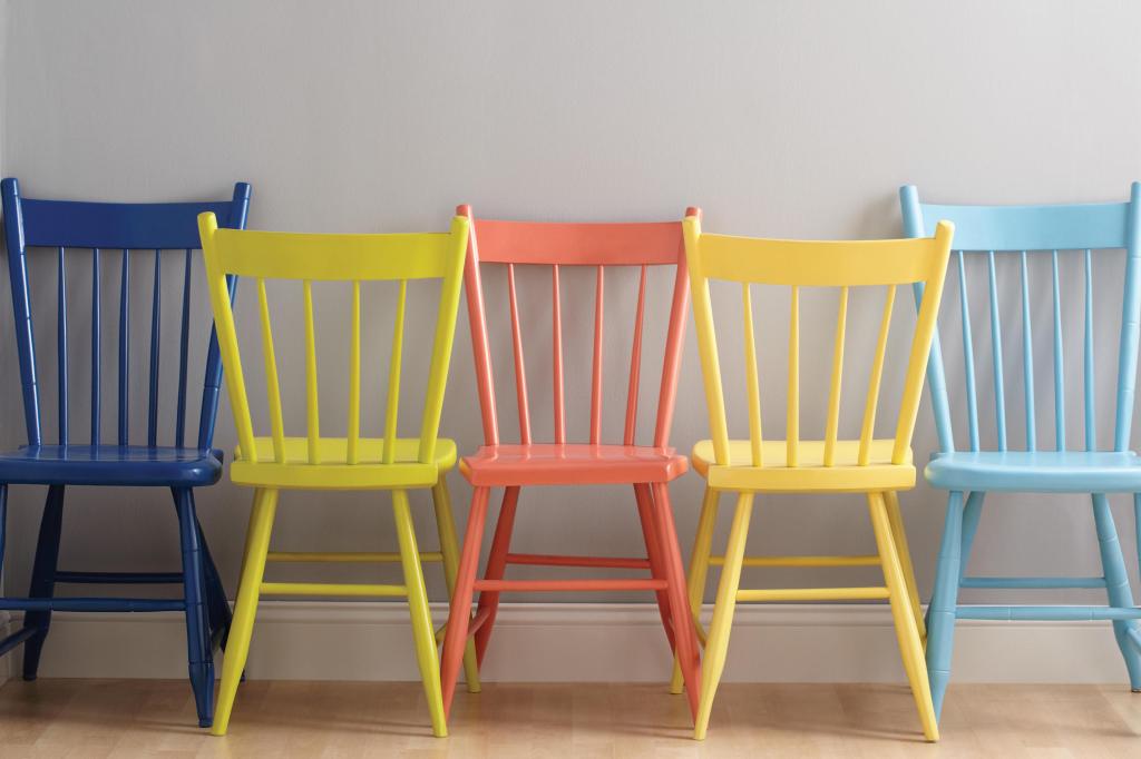 Wooden chairs can be re-invented by spray-painting in vivid shades.