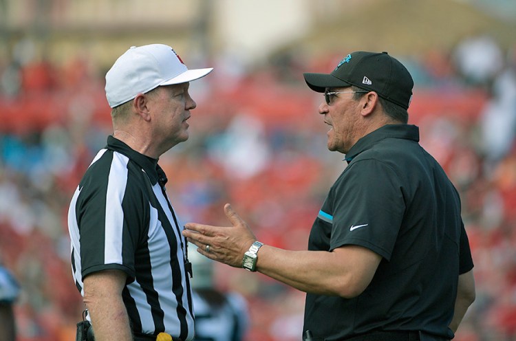 Referee Carl Cheffers  gets an earful from Carolina Panthers head coach Ron Rivera a game against the Tampa Bay Buccaneers on Jan. 1, 2017, in Tampa.