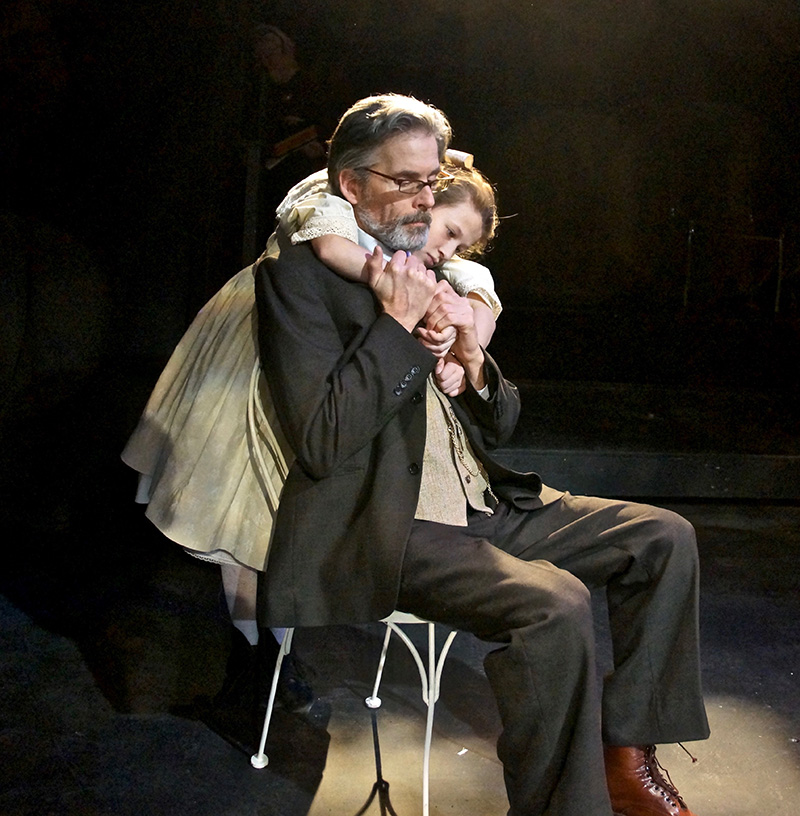 Maiya Koloski as Iris and Paul Haley as Papa, in a scene from "The Nether." 