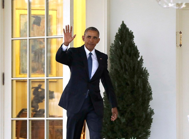 President Barack Obama waves as he leaves the Oval Office of the White House on Jan. 20.