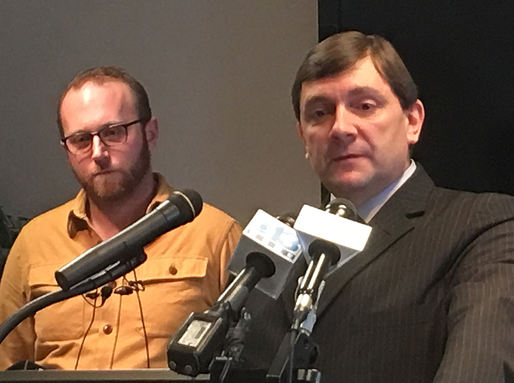 Andrew Volk, left, a Portland restaurateur and an advocate for affordable health care, joins Senate Minority Leader Troy Jackson, D-Allagash, at a news conference in Augusta on Wednesday.