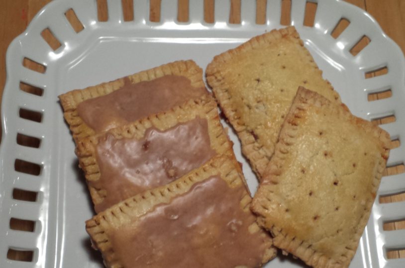 Homemade varieties of Pop-Tarts include brown sugar cinnamon frosted, left, and raspberry. The recipe offers eight filling options and suggestions for experimenting with your favorite flavor.