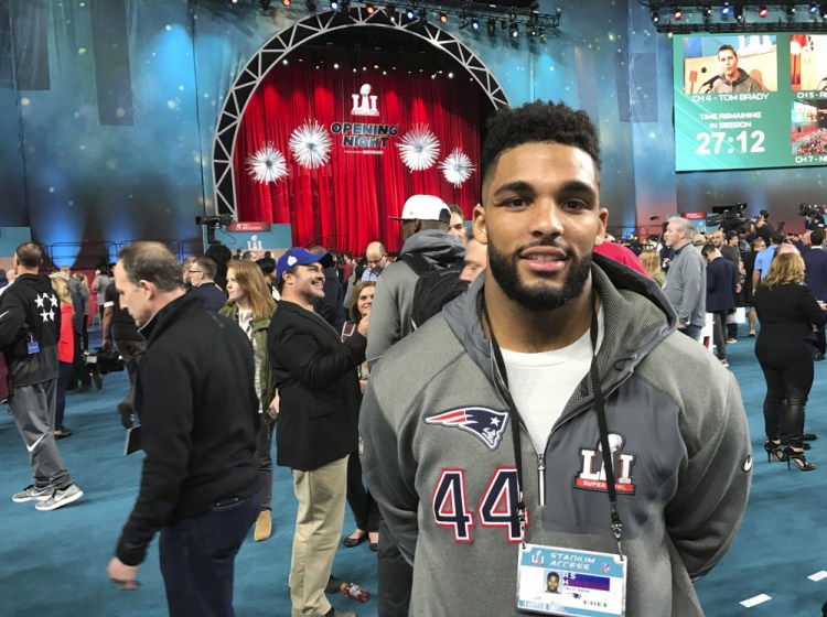 Trevor Bates, 23, is where the action is this week at opening night ceremonies for Super Bowl LI in Houston. Bates, a former UMaine star, started on the Patriots' practice squad in November.