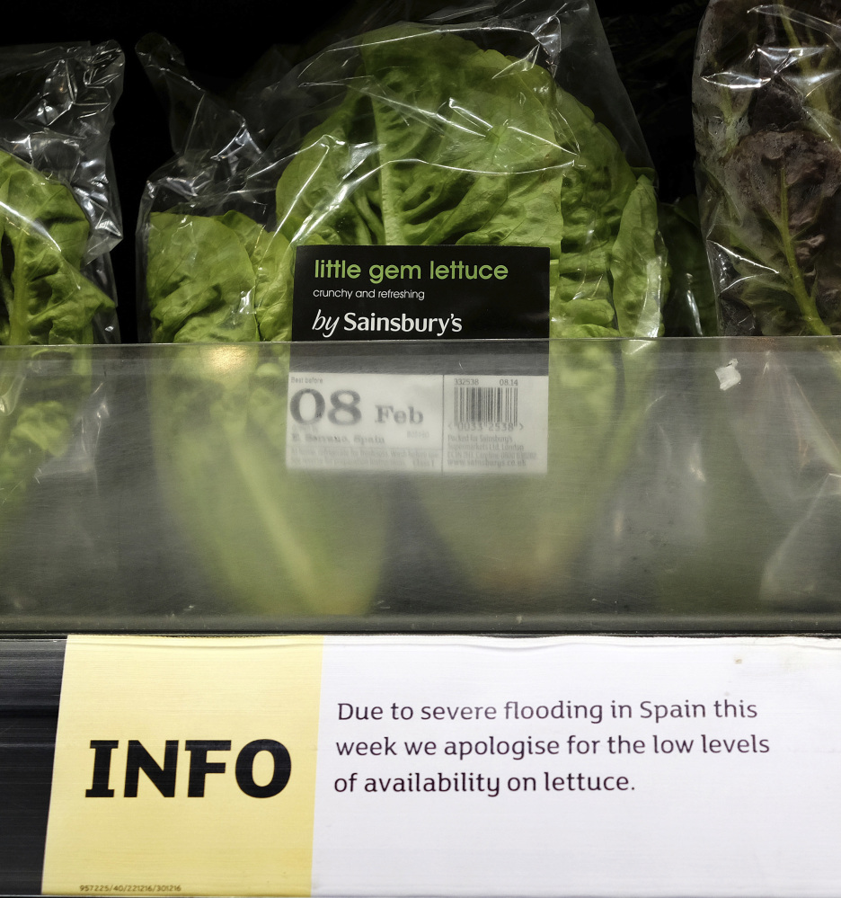 A sign warning of lettuce shortages is displayed in a London supermarket. Europe is suffering a shortage of lettuce, broccoli and other vegetables, with shelves going bare in some supermarkets, because of bad weather.