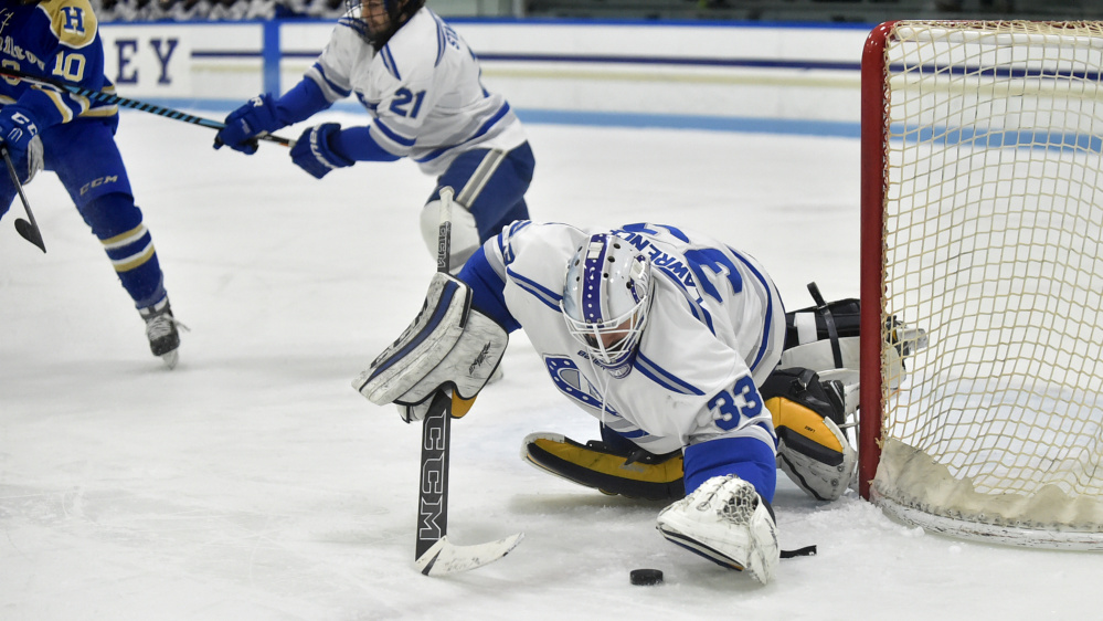 Colby goalie Sean Lawrence makes a save against Hamilton in the first period Friday night.