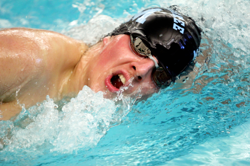 Messalonskee's Nathan Ruel competes in the 500-yard freestyle at the Kennebec Valley Athletic Conference Class A meet Saturday in Bath.