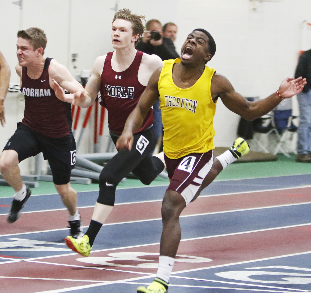 Jabari Washington of Thornton Academy finishes first in the 55-meter dash at the SMAA indoor track and field championships Saturday at the University of Southern Maine's Costello Sports Complex.
