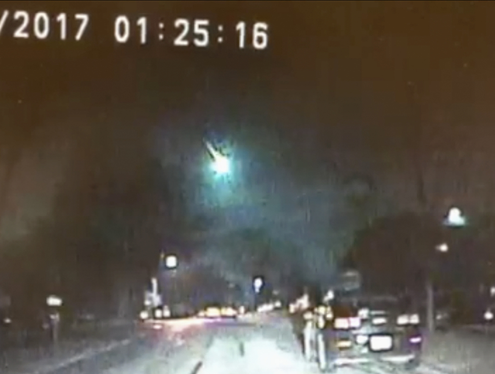 Dashcam video image provided by police in Lisle, Ill., shows a meteor as it streaked over Lake Michigan early Monday. The meteor lit up the sky across several states in the Midwest.