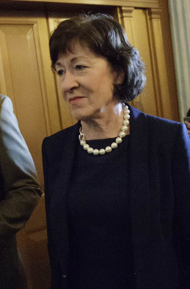 Sen. Susan Collins of Maine, who defected from the Republican majority, arrives at the Senate chamber Tuesday for the Senate vote on Education Secretary-designate Betsy DeVos. Vice President Mike Pence was needed to cast the tie-breaking vote to confirm DeVos.