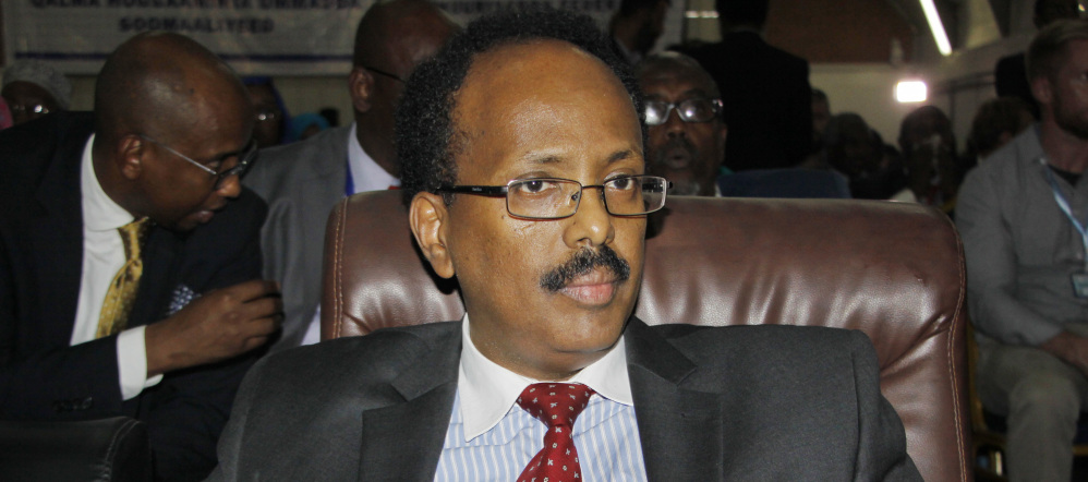 Mohamed Abdullahi Farmajo sits in the election hall in Mogadishu after being declared president of Somalia on Wednesday. "This is the beginning of the era of unity, the democracy of Somalia and the beginning of the fight against corruption," he said after taking the oath of office.