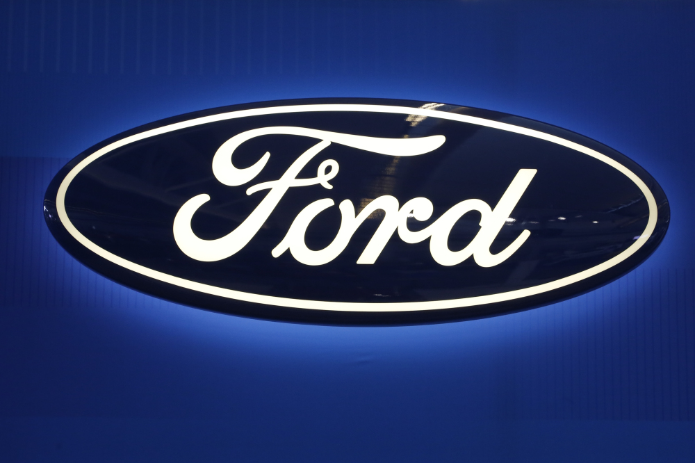 Ford Motor will spend $1 billion to take over a robotics startup as it works toward developing a fully driverless vehicle by 2021.