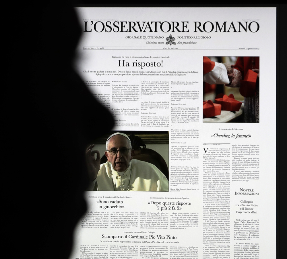 A fake copy of the Vatican newspaper L'Osservatore Romano, with the headline reading "He responded!", is shown in Rome.
