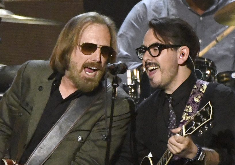 Tom Petty and Dhani Harrison, son of the late Beatle, perform Friday at a benefit in Los Angeles.