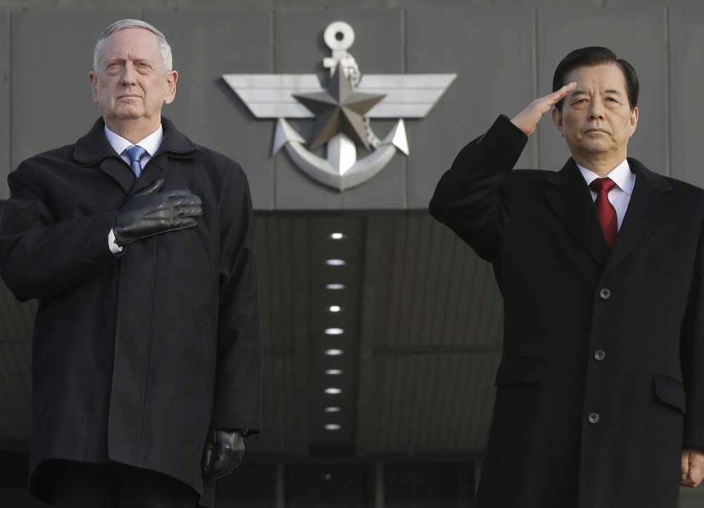 Defense Secretary Jim Mattis and South Korean Defense Minister Han Min Koo salute during a welcome ceremony for Mattis at the Defense Ministry in Seoul, South Korea, on Feb. 3. On Tuesday, Mattis plans to head to Europe as he works to develop a strategy dealing with terrorism.
Associated Press/Ahn Young-joon