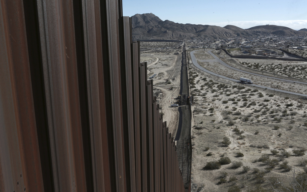 Part of the fence on the Mexican border stretches into the distance in Sunland Park, N.M.