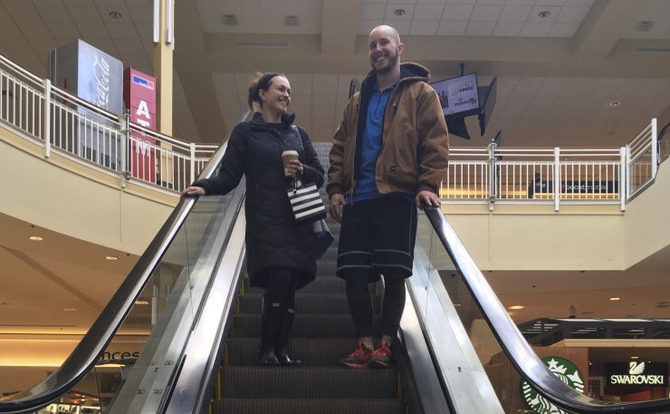 Courtney Taylor and her boyfriend, Zach Tobias, shop at a mall in Whitehall, Pa. They don't mix shopping with politics, but say it seems to be happening more often during the Trump era as activists who oppose or support the president target stores and brands for boycotts.
