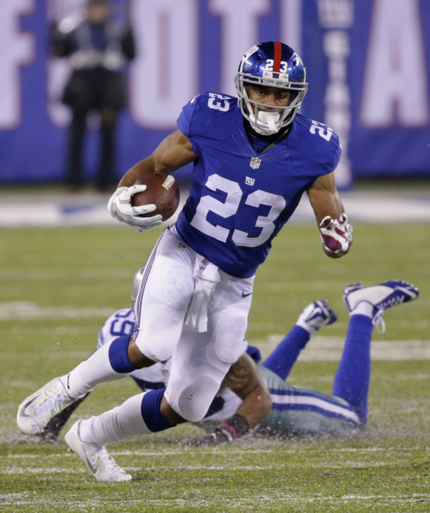 Running back Rashad Jennings was the Giants' leading rusher last season with 593 yards. New York released the running back on Monday, along with wide receiver Victor Cruz, in a move that saves the team about $10 million in cap space.