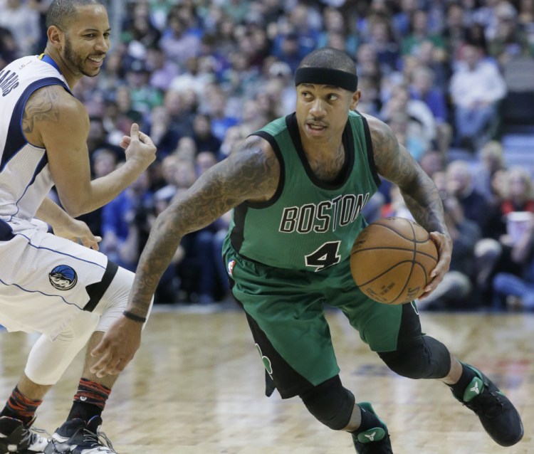 Isaiah Thomas, driving past Devin Harris of the Dallas Mavericks during the second half Monday night, says the Boston Celtics are looking to keep their surge going with games Wednesday and Thursday before the All-Star break.