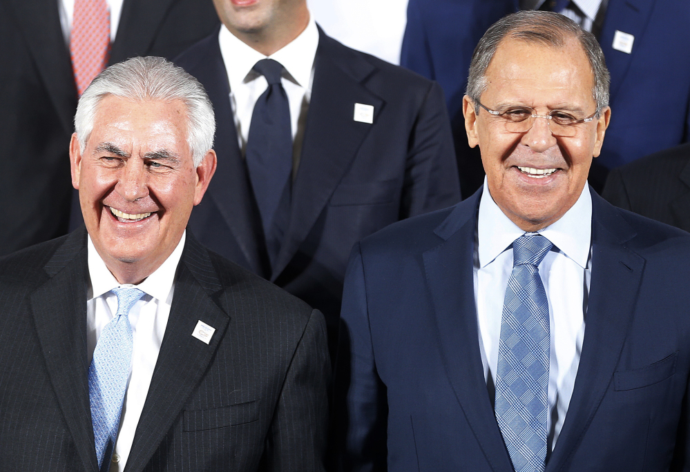 Russian Foreign Minister Sergei Lavrov, right, and Secretary of State Rex Tillerson attend the G-20 foreign ministers meeting Thursday.