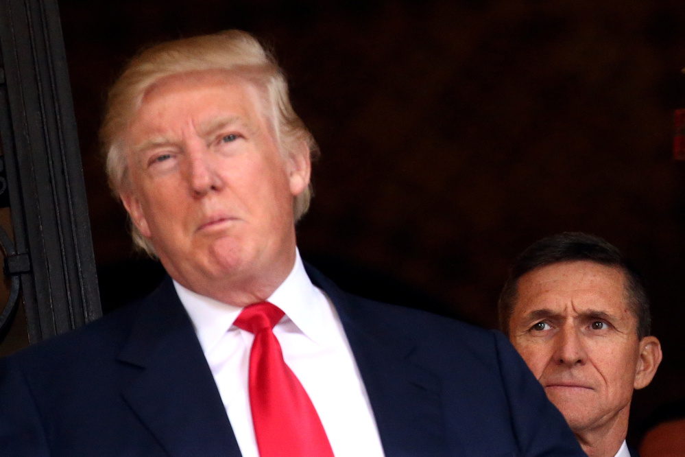 President Trump was reportedly told Jan. 26 that Michael Flynn, right, had misled then-Vice President-elect Mike Pence about the nature of his dealings with Russian diplomats – so why did it take another three weeks for Flynn to step down as national security adviser?
