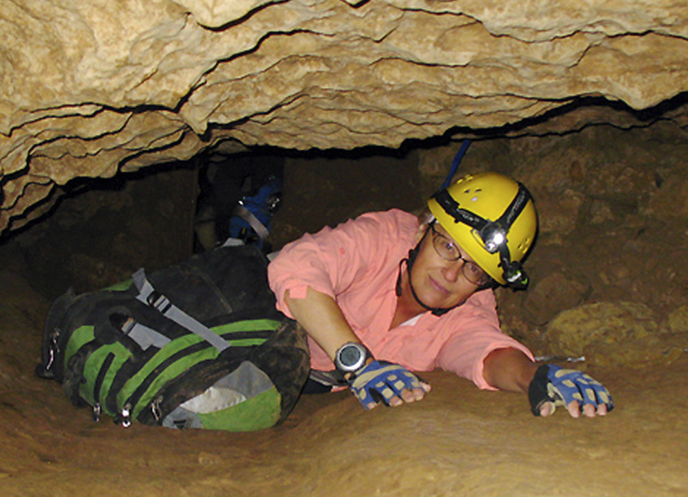 Penny Boston, shown in a cave in New Mexico in 2008, says  microbes trapped in crystals in a Mexican cave could be 50,000 years old.