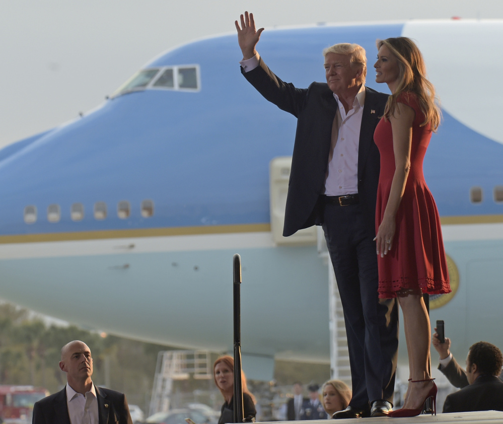 President Trump and first lady Melania Trump at a rally Saturday in Melbourne, Fla. Trump also held a rally there in September, and he said he returned because "life is a campaign."