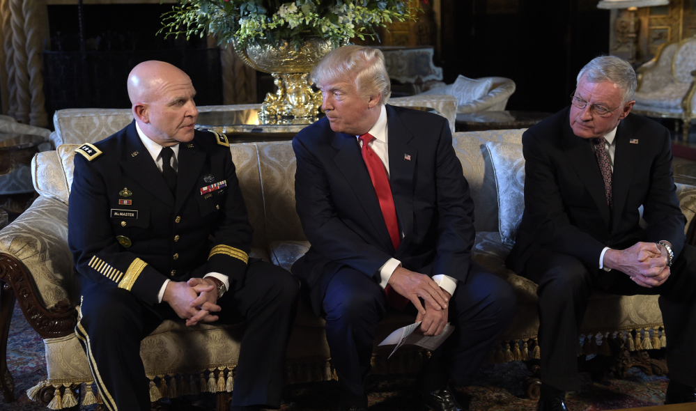President Trump sits between Army Lt. Gen. H.R. McMaster, left, and retired Army Lt. Gen. Keith Kellogg at Trump's Mar-a-Lago estate in Palm Beach, Fla., on Monday. Trump announced that McMaster will be the new national security adviser. Kellogg, who had been his acting adviser, will now serve as the National Security Council chief of staff.