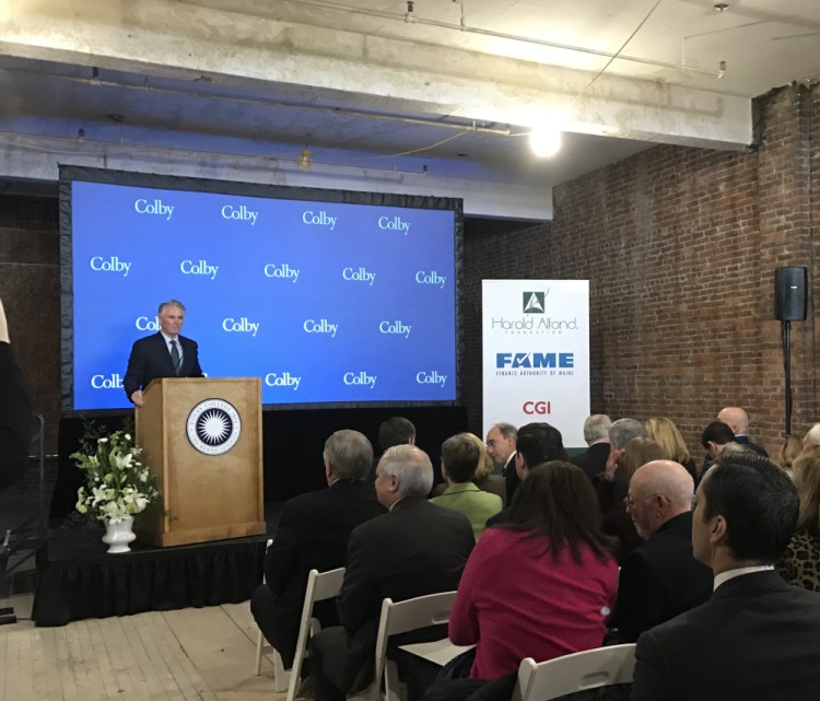 Colby College President David Greene speaks Tuesday at a gathering in the former Hains Building, where the Alfond Foundation announced a new program designed to help reduce college student debt for those who study science, technology, engineering and mathematics and work in Maine for at least five years.