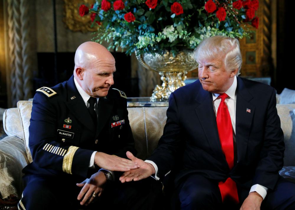 President Trump shakes hands with his new national security adviser, Army Lt. Gen. H.R. McMaster, after announcing the appointment in Palm Beach, Fla., on Monday.