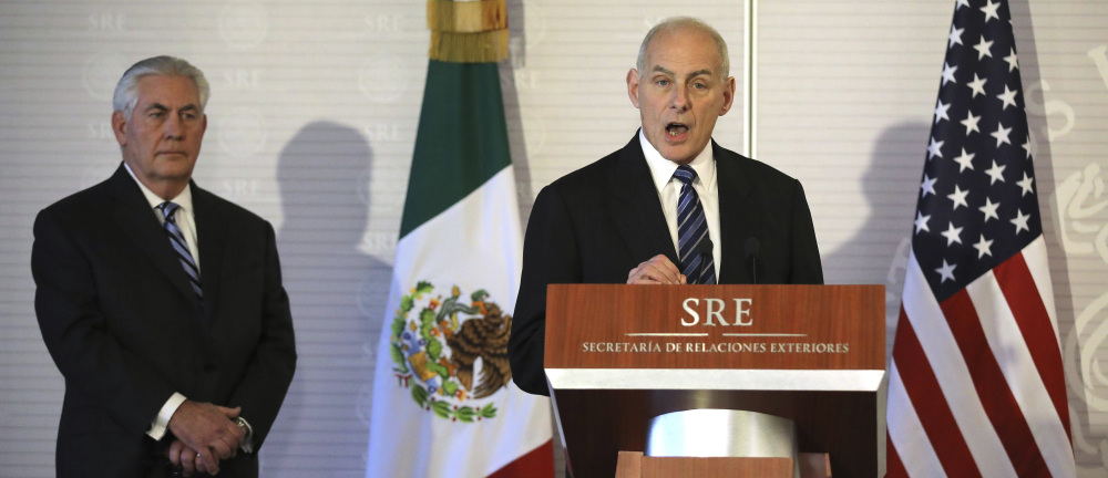 Homeland Security Secretary John Kelly, right, accompanied by Secretary of State Rex Tillerson, speaks at the Mexican Ministry of Foreign Affairs in Mexico City, Mexico, on Thursday.