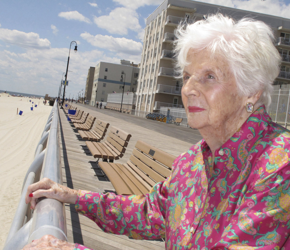 Lucille Conlin Horn stands on the boardwalk in Long Beach, N.Y., in July 2015. Born prematurely in 1920, she was not expected to survive before her parents entrusted her to a Coney Island doctor now seen as a pioneer in neonatology.