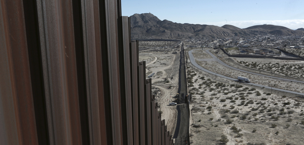 the Mexico-US border fence, on the Mexican side, separating the towns of Anapra, Mexico and Sunland Park, New Mexico, Wednesday, Jan. 25, 2017.  U.S. President Donald Trump will direct the Homeland Security Department to start building a wall at the Mexican border. (AP Photo