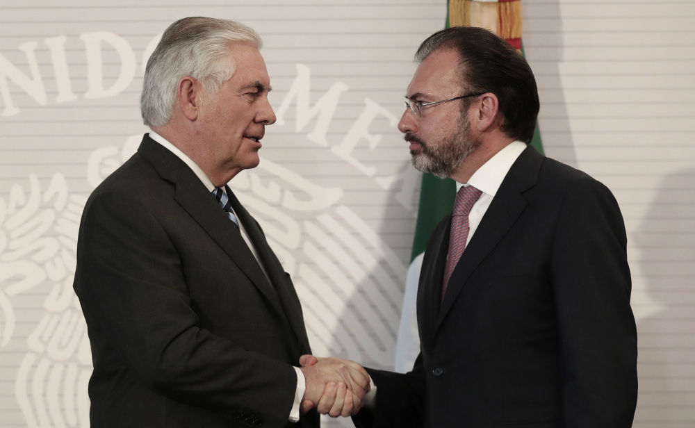 U.S. Secretary of State Rex Tillerson, left, shakes hands with Mexico's Foreign Relations Secretary Luis Videgaray in Mexico City on Thursday, but it's a tense time for the U.S. and Mexico.