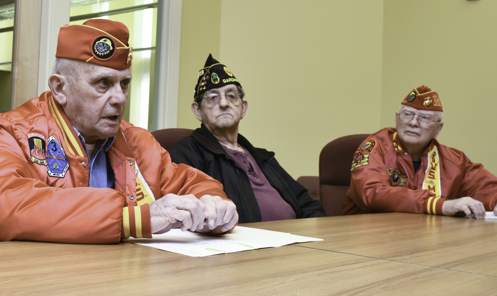 Ralph Sargent, left, and Bill Schultz, right, leaders of Marine Corps League Kennebec Valley Detachment 599, and Roger Paradis of Gardiner American Legion Post 4 discuss the continuing decline in veterans group membership.