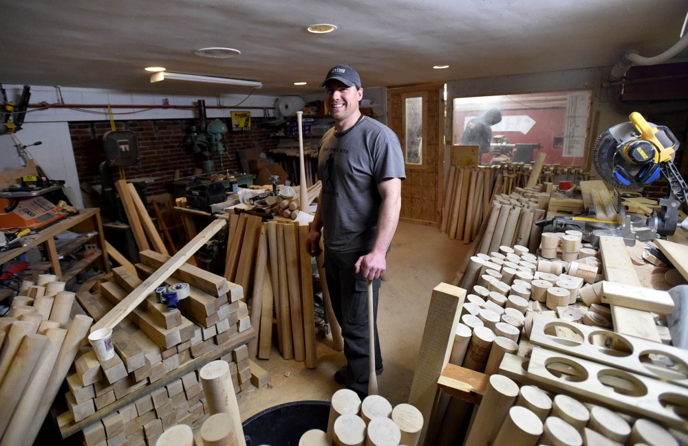 Jesse LaCasse makes baseball bats in the basement of what is now a baseball center at 4 Madison Ave. in Skowhegan. 