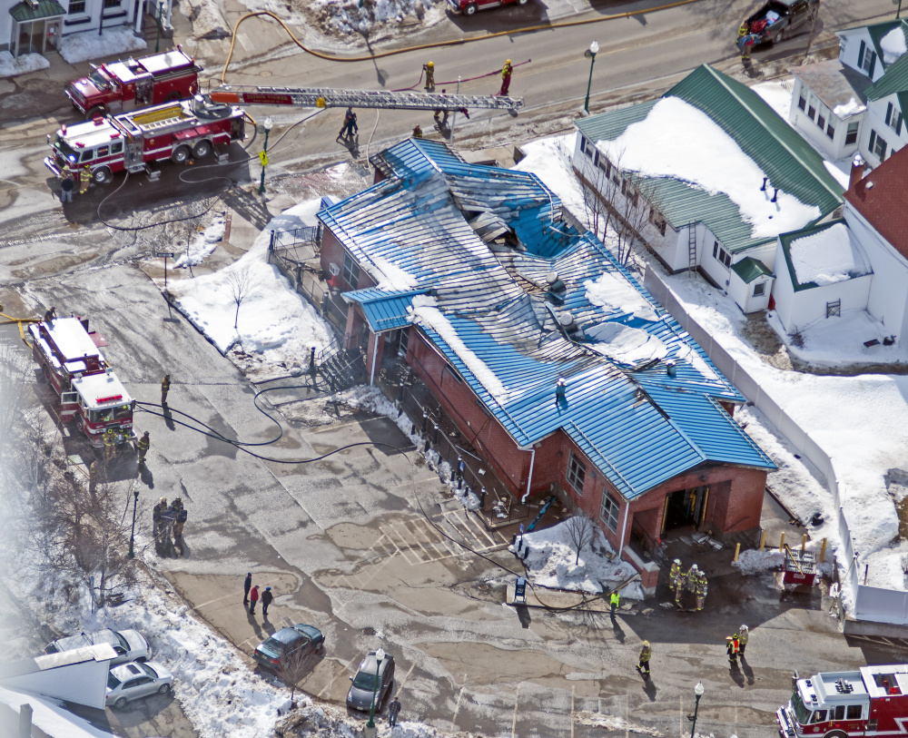 This aerial photo shows the fire damage last Tuesday at the post office in Winthrop, which will now have to be torn down because of the extensive damage.