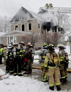 Crews were still on the scene five hours after a fire was reported at 15 Summer St. in Waterville on Wednesday. The batteries had been removed from the smoke detectors, officials say.