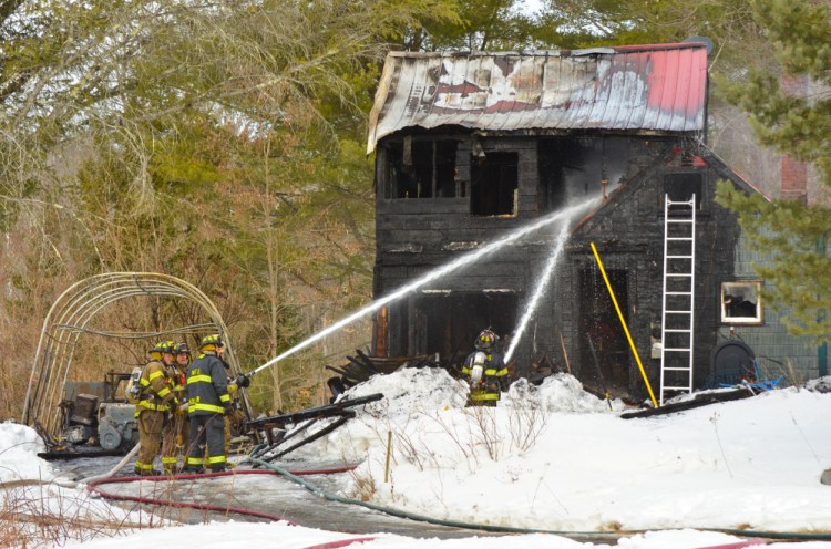 Fire crews from Monmouth and surrounding towns returned to a home on Mt. Pisgah Road around 9 a.m. Wednesday after first extinguishing a fire there earlier in the morning. The fire, which started in a portable garage unit, destroyed the home.