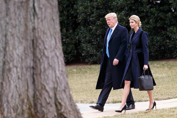 President Trump and  daughter Ivanka walk to Marine One on the South Lawn of the White House Wednesday. 