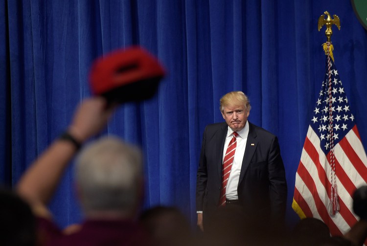 President Donald Trump finishes speaking to troops while visiting U.S. Central Command and U.S. Special Operations Command at MacDill Air Force Base in Tampa, Fla.,Monday, Feb. 6, 2017.  AP Photo/Susan Walsh)