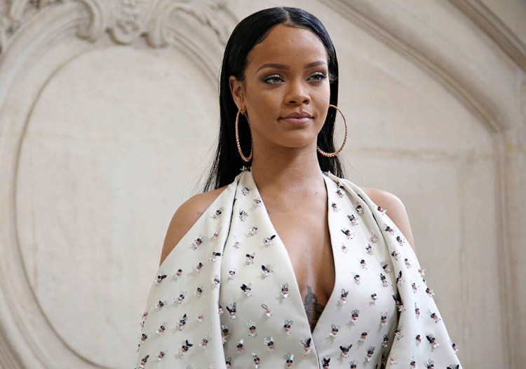 Rihanna arrives at Christian Dior's Spring-Summer 2017 ready-to-wear fashion collection  in Paris. In yet another landmark for the singer, she has now landed 30 songs in the top 10 of the Billboard Hot 100 chart, a feat achieved only by the Beatles and Madonna.
