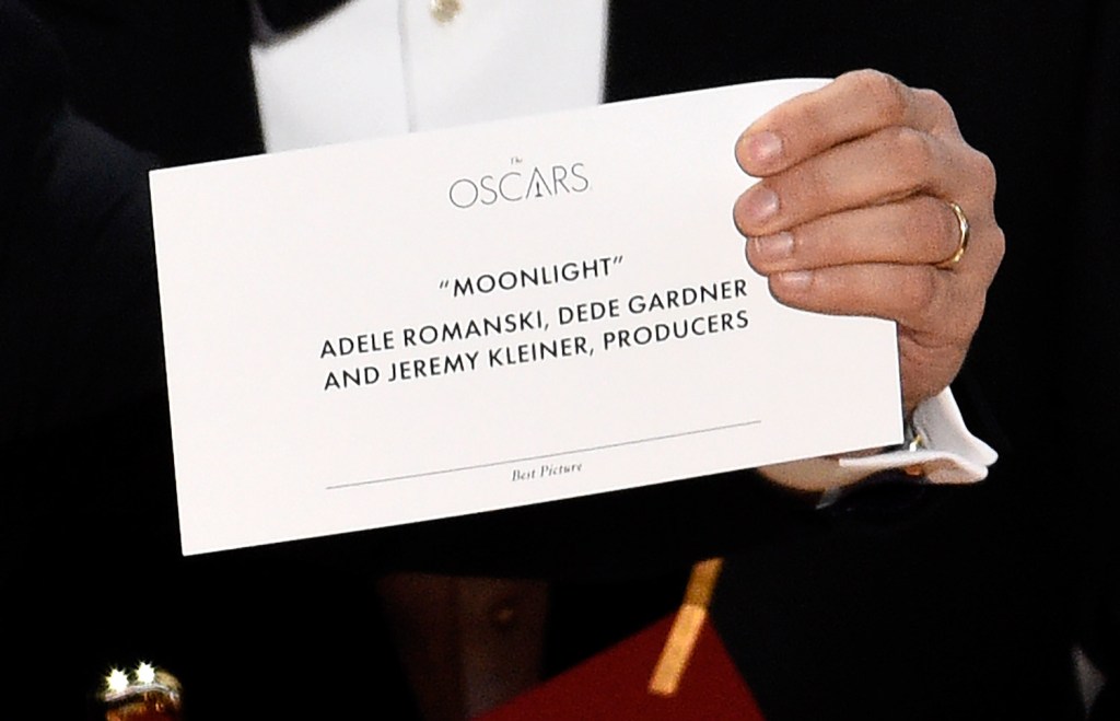 Jordan Horowitz holds up the envelope that reveals "Moonlight" as the true winner of the award for best picture at the Oscars on Sunday at the Dolby Theatre in Los Angeles. 