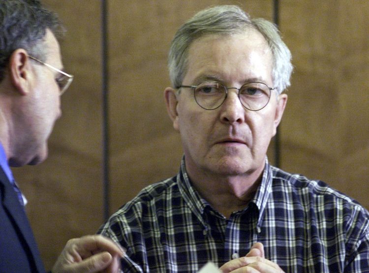 Former Catholic priest Ronald Paquin, shown in court in Haverhill, Mass., in 2002, faces 31 charges of sexual abuse in Maine dating back to the 1980s.